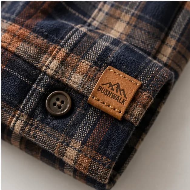 A Bushwalk leather label on a flannel shirt cuff