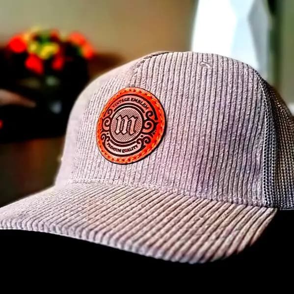 Corduroy trucker cap with leather patch
