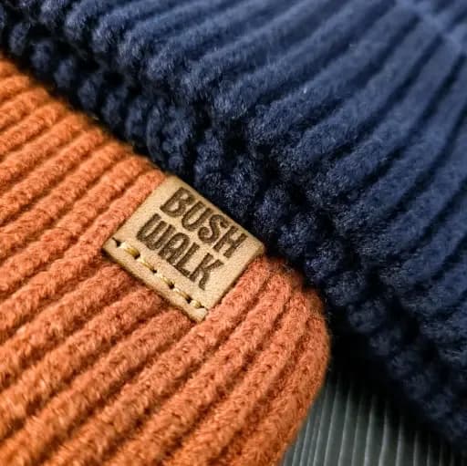 Cuffed beanies with an engraved leather label